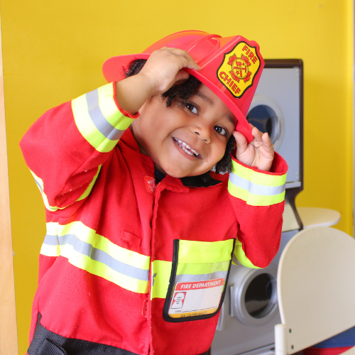 Kid dressed as fireman